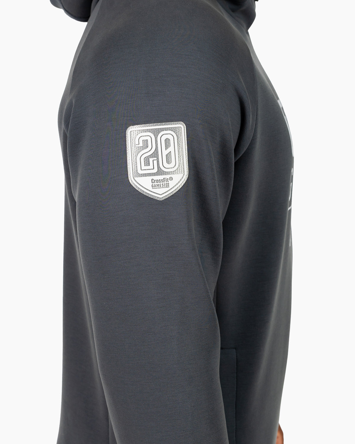 Close-up of the official patch on the sleeve of the unisex Velites HOLO CrossFit Games 2026 hoodie