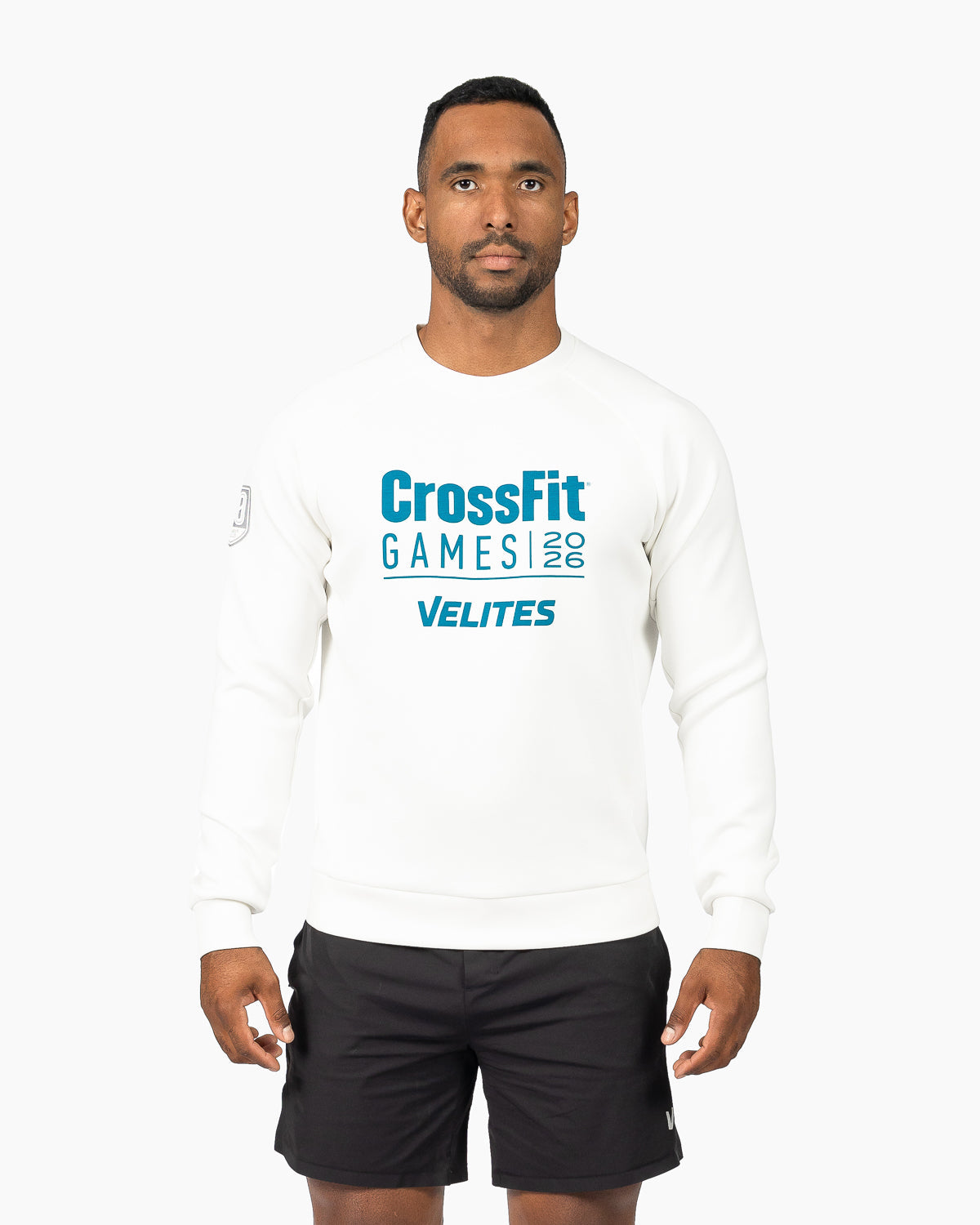 Front view of the official pearl white unisex 20th Anniversary CrossFit Games crewneck sweatshirt by Velites