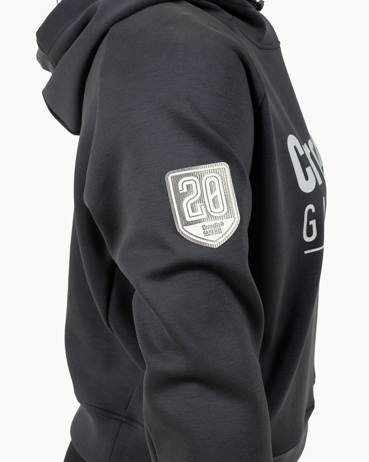 Close-up of the retro 2013-2016 graphic on the sleeve of the Velites crop hoodie