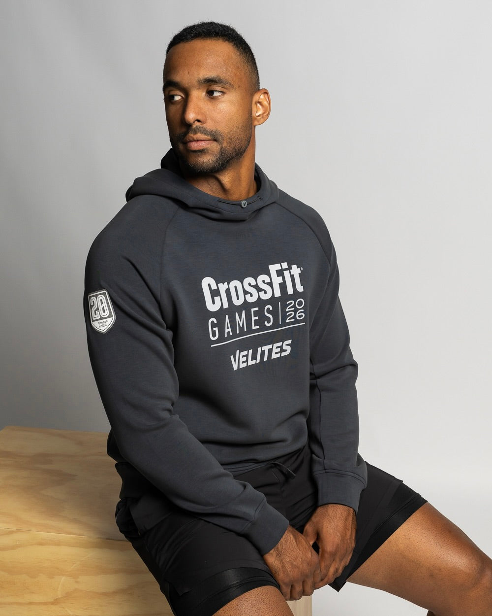 Athlete wearing the official unisex Velites HOLO CrossFit Games 2026 hoodie inside a gym