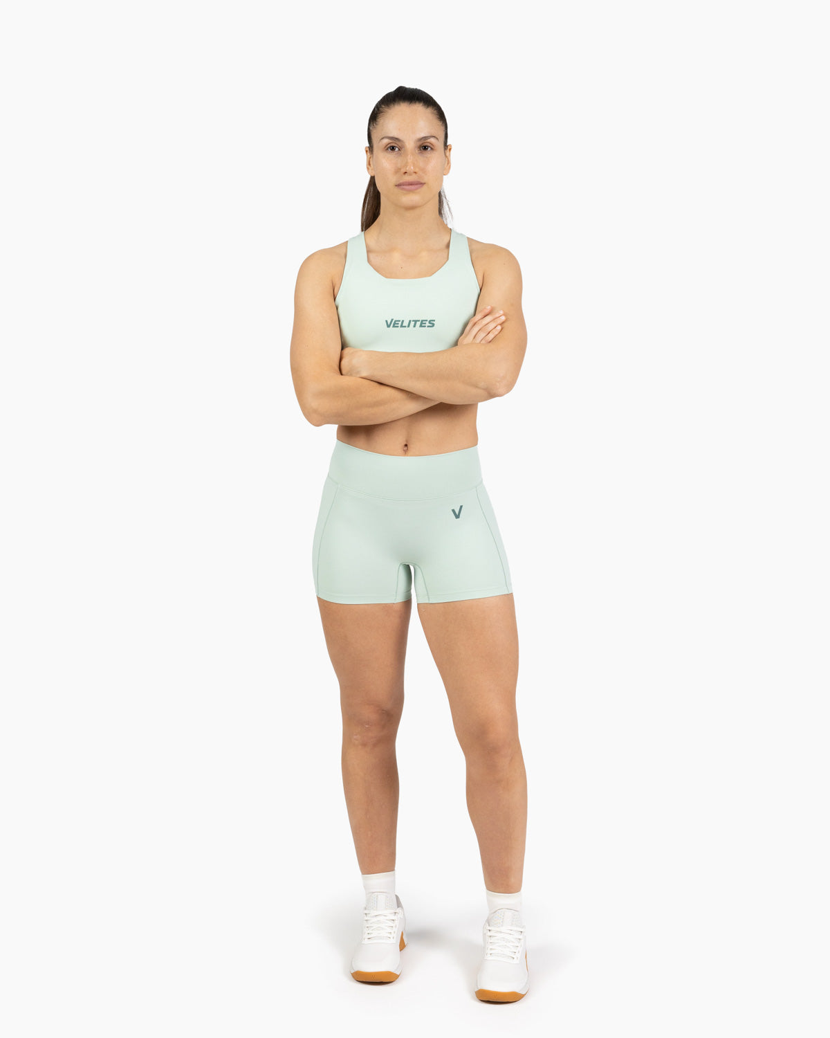 High neck bra Holo Velites female model exercising color_Mojito
